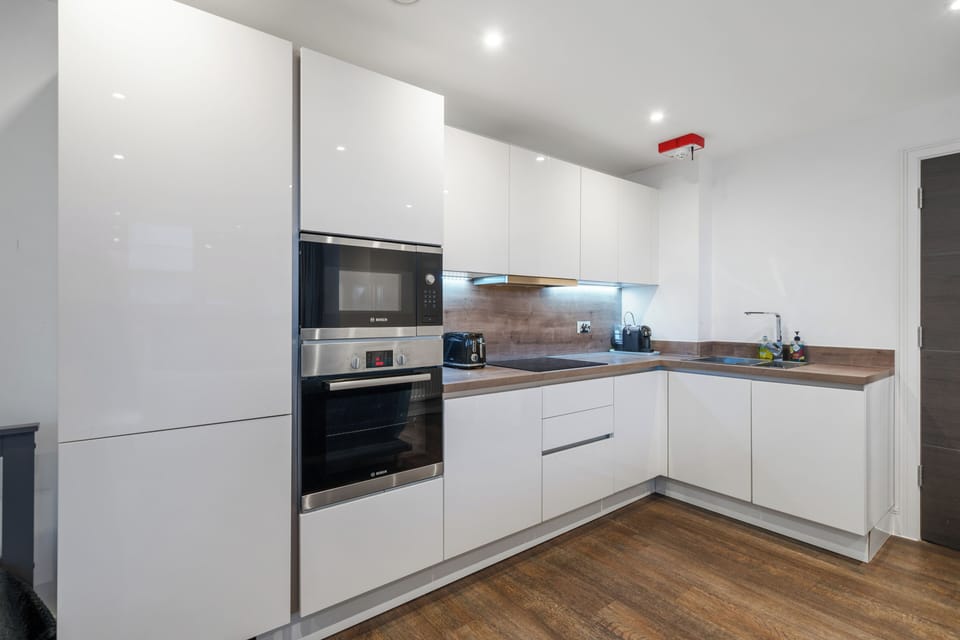 Premium Apartment, Kitchen, City View | Living room | 50-inch Smart TV with satellite channels
