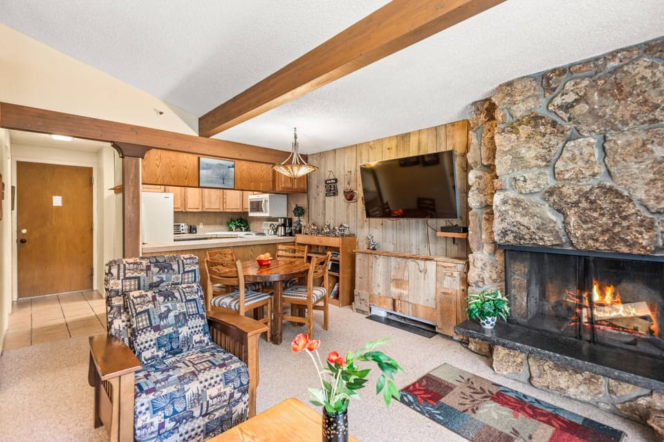 Embrace the timeless appeal of this retreat and experience the magic of mountain living.  Let the warmth of the wood fireplace ease your worries away!