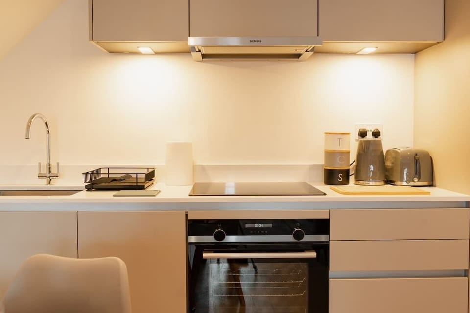 The Open Plan Living Space: the modern & convenient kitchen space  means cooking or making hit drinks a breeze.