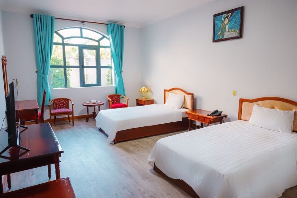 Family Triple Room, Pool View | Desk, iron/ironing board, WiFi (free)