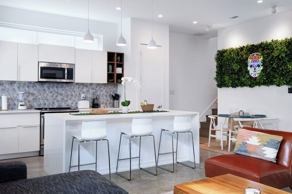 Large kitchen island with barstools.