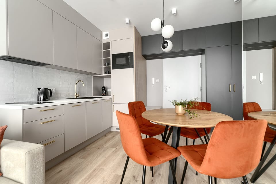 Deluxe Apartment, City View | Living area | 130-cm flat-screen TV with cable channels