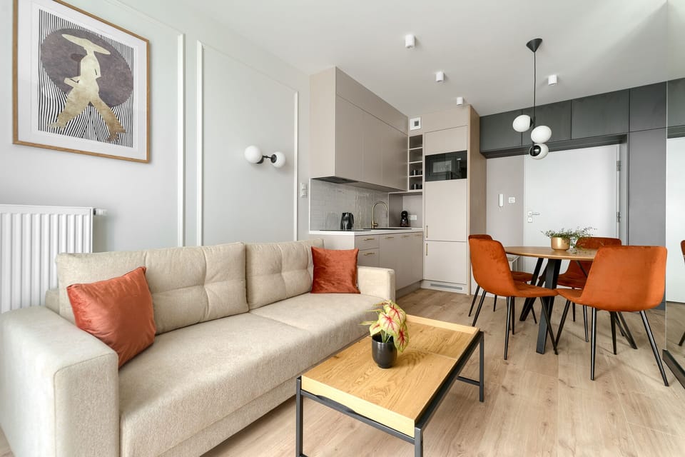 Deluxe Apartment, City View | Living area | 130-cm flat-screen TV with cable channels