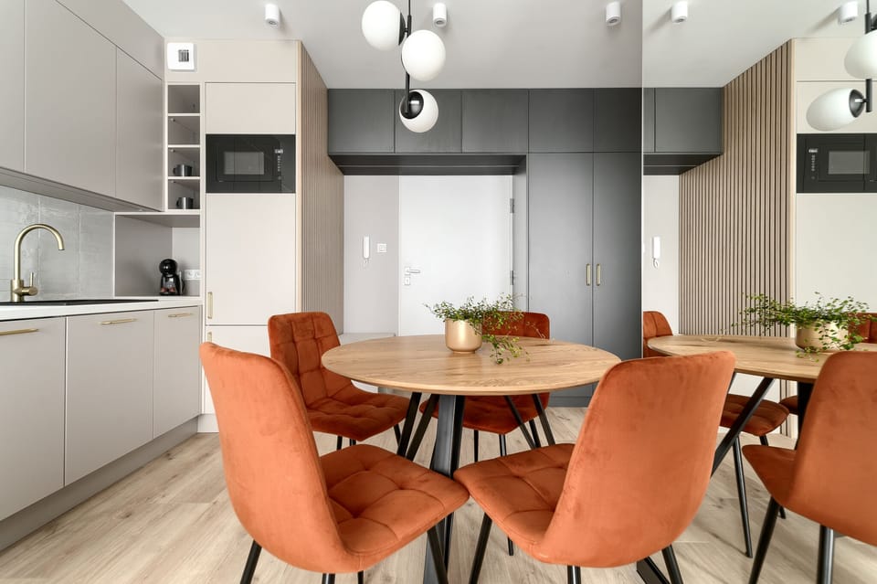 Deluxe Apartment, City View | Living area | 130-cm flat-screen TV with cable channels