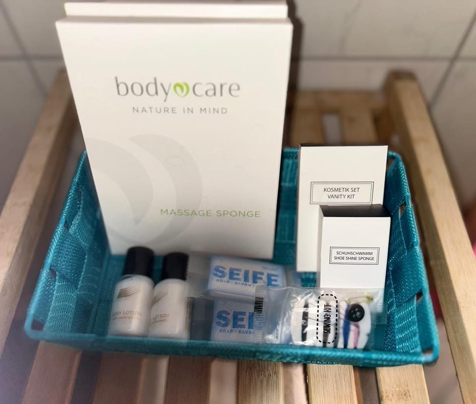 Shower, free toiletries, hair dryer, slippers