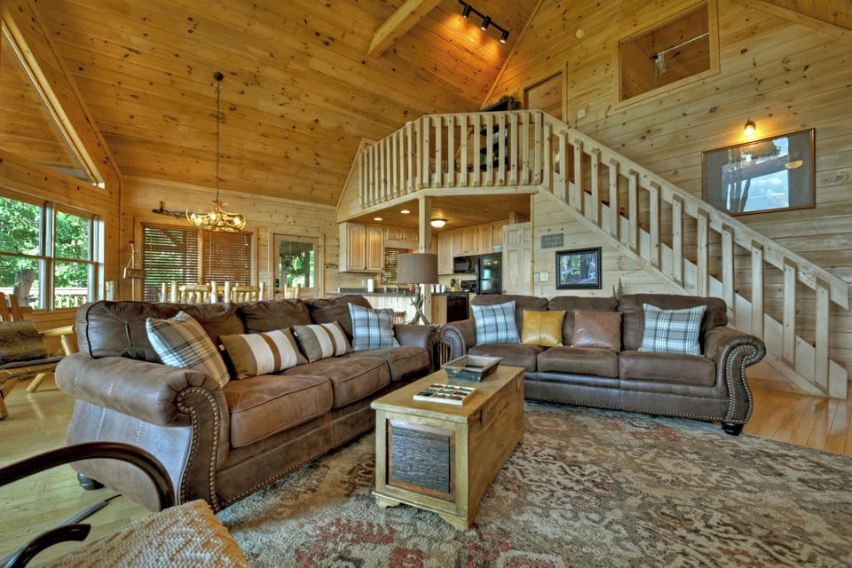 Comfy seating for everyone at this family-sized cabin rental in Blue Ridge