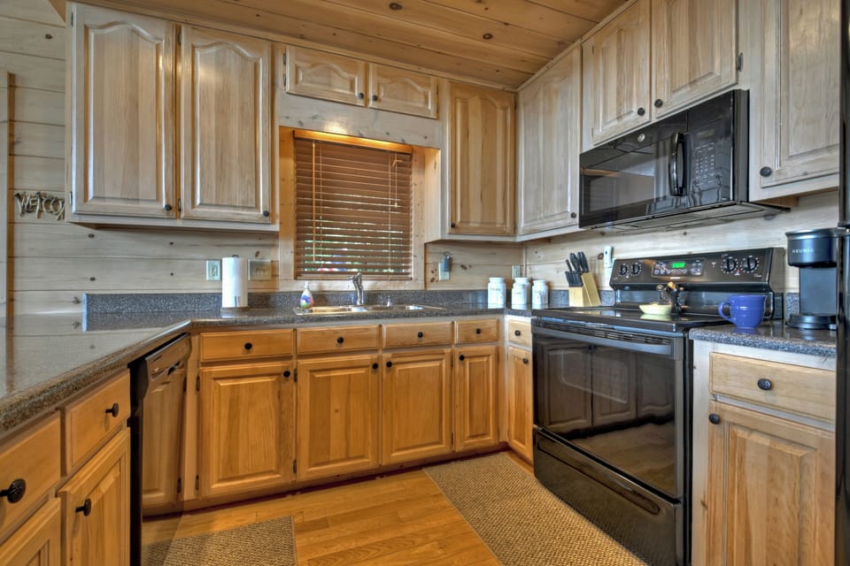 Fully stocked kitchen at this luxury cabin rental in North Georgia