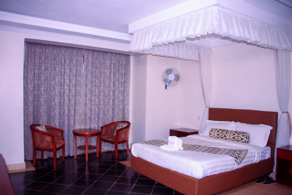 Deluxe Suite, City View | 1 bedroom, desk, laptop workspace, free WiFi