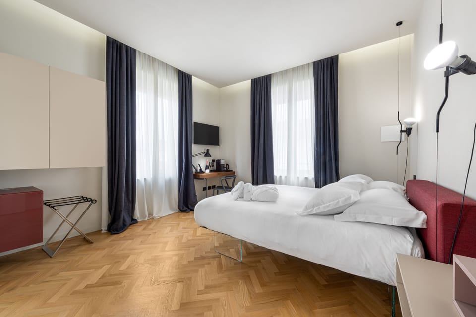 Deluxe Room, Pool View | Egyptian cotton sheets, premium bedding, down comforters, minibar