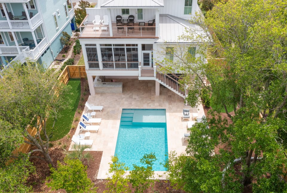 Welcome to Lil Pink House—your perfect coastal getaway just steps from the beach