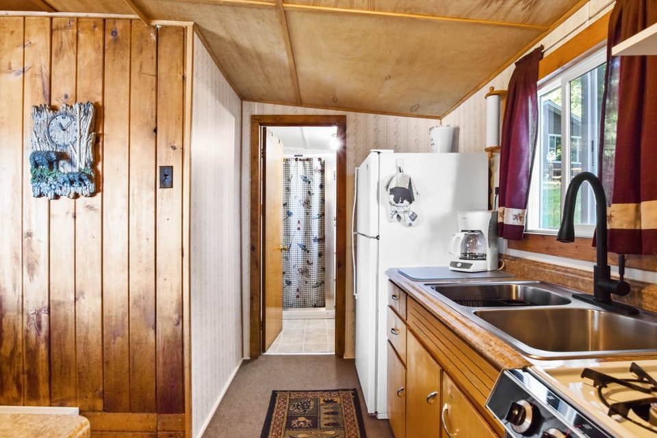 Bathroom with shower off of the kitchen.