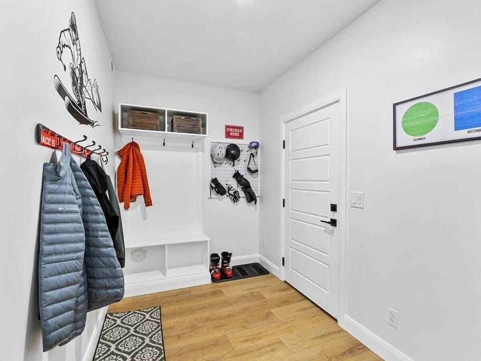 There is a bench for you to put on/take off shoes, and a place to hang coats in the entry way.