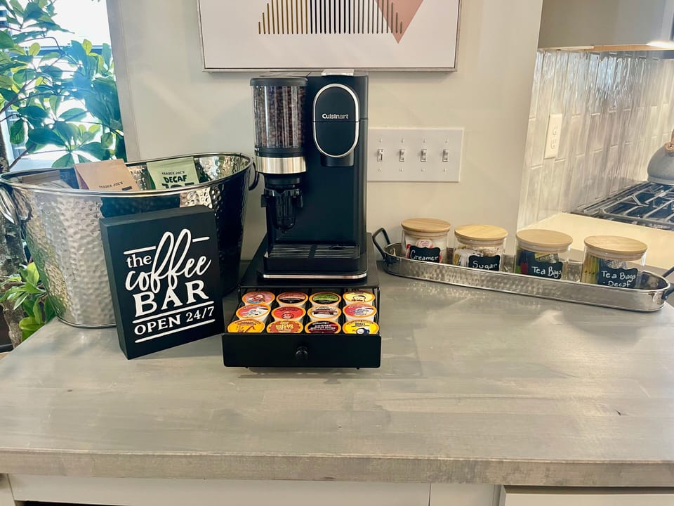 Complimentary Coffee and Tea bar with sugar and creamer