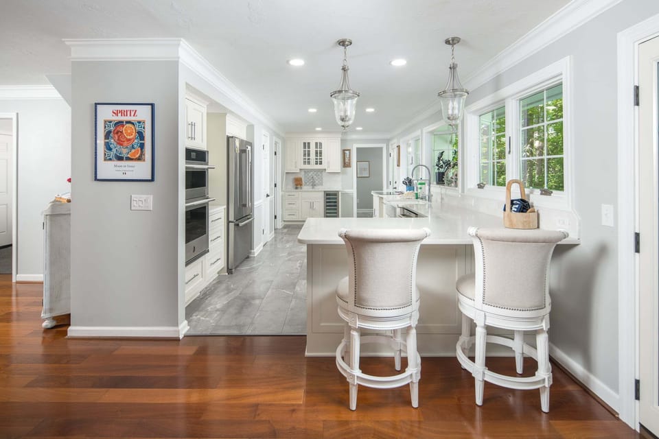 Kitchen island with bar seating and open-concept layout