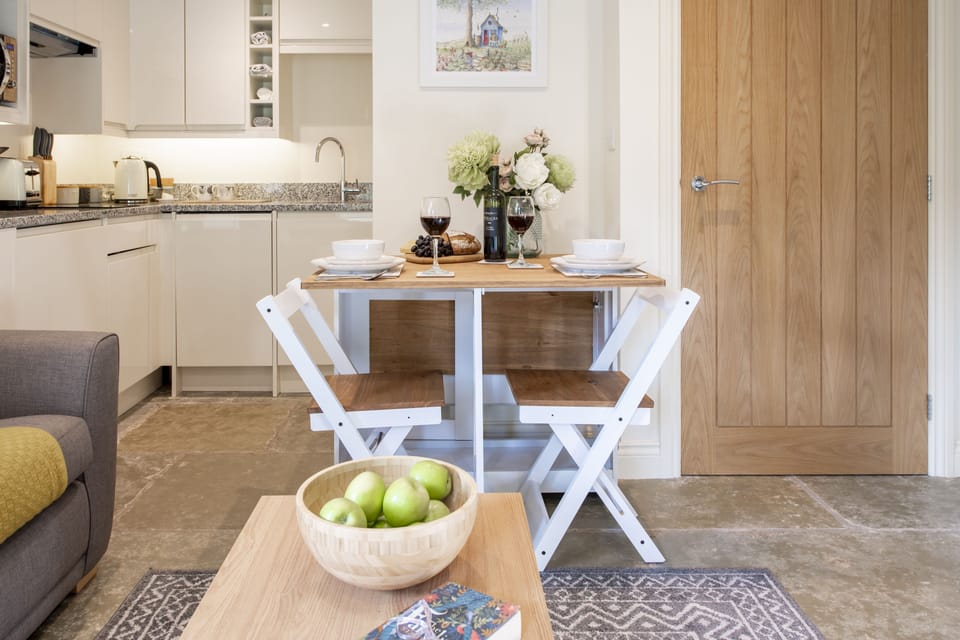 Ground floor: Foldable dining table seating two guests