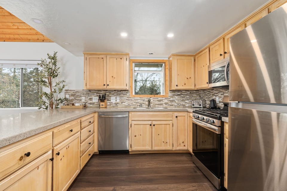 All New Kitchen Appliances and large open counter space