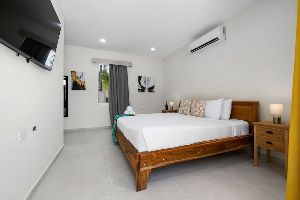 Escape to comfort and tranquility in our modern bedroom sanctuary, where every detail ensures a peaceful rest