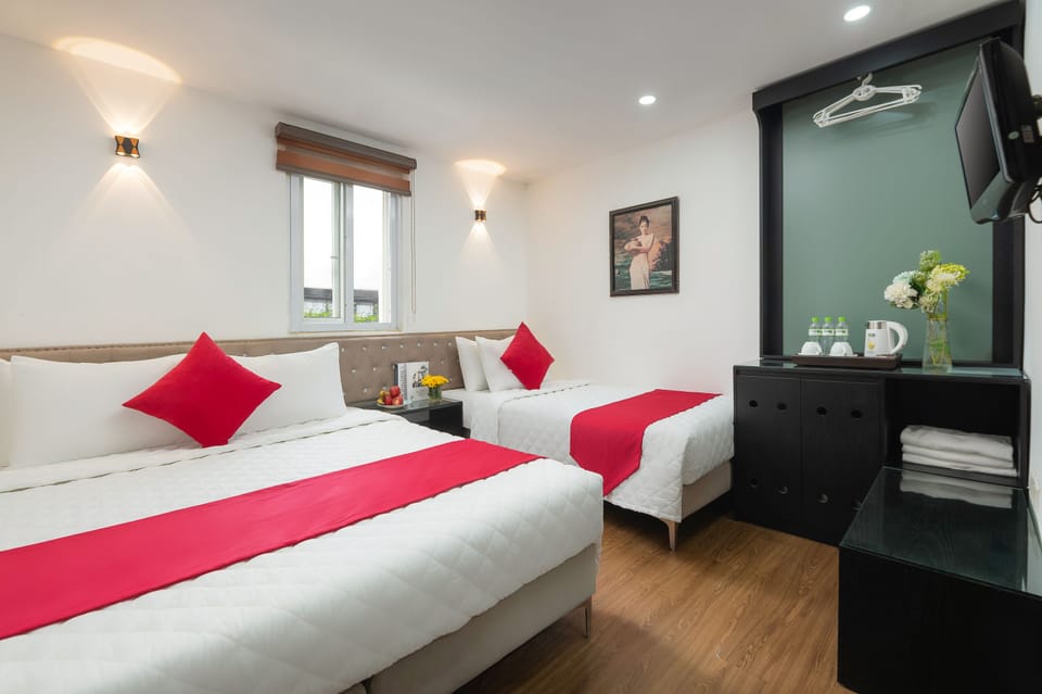 Superior Triple Room | Minibar, in-room safe, desk, soundproofing