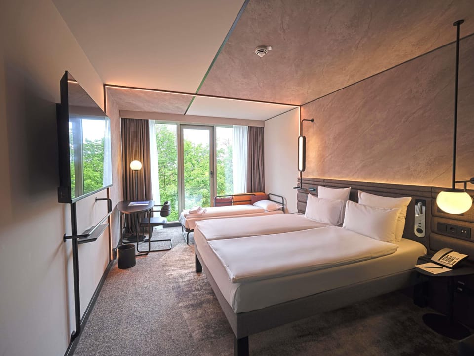 Premium Family Room | Hypo-allergenic bedding, in-room safe, laptop workspace, soundproofing