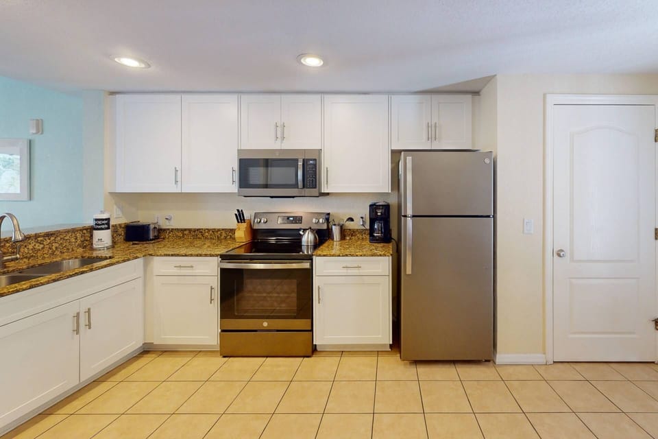 Fully Equipped Kitchen Ready for Any Meal Preparation