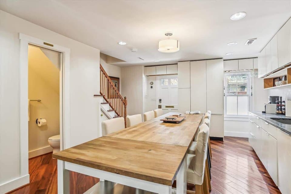 This cozy dining room is a space that invites warmth and togetherness. It is designed to provide a delightful setting for shared meals and cherished moments with friends and family. 