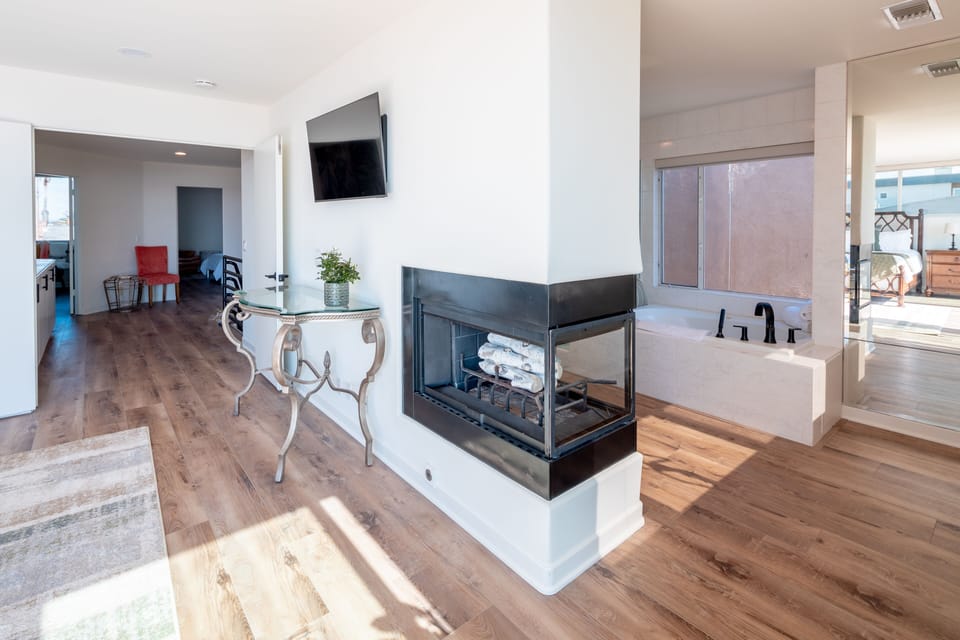 Gas Fireplace (#3of 3) is open to the bedroom and bathroom.