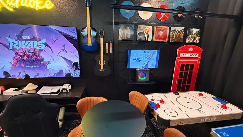 🎨 Vibrant game room with murals, cozy seating, arcades, and consoles — perfect for fun nights and Instagram, TikTok, Snapchat moments 📸.