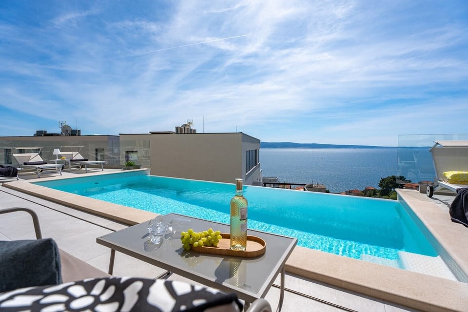 A panoramic view of the sea stretches endlessly toward the horizon