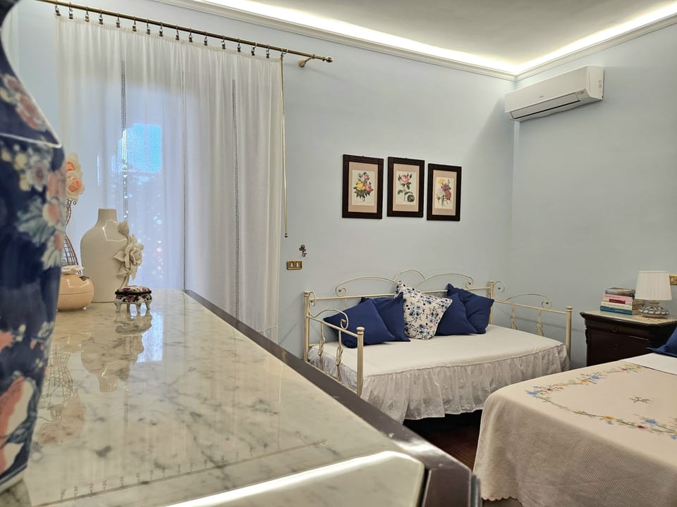 Triple Room, Pool View | Individually furnished, free WiFi