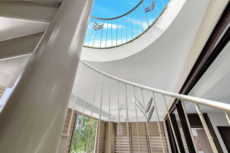 Follow the staircase from the balcony to your secluded rooftop sanctuary, complete with a spa, BBQ, and outdoor dining area.