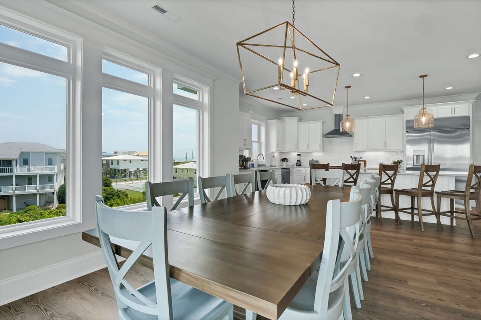 Bright dining area with large wooden table