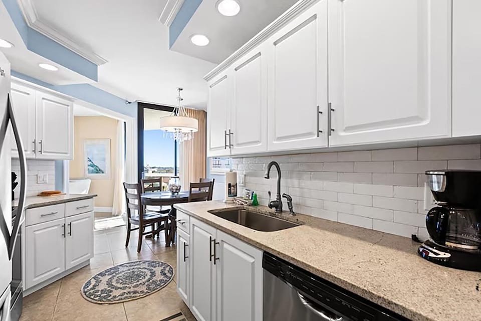 Condo, Multiple Beds (Surfside Resort #311) | Private kitchen | Oven, toaster