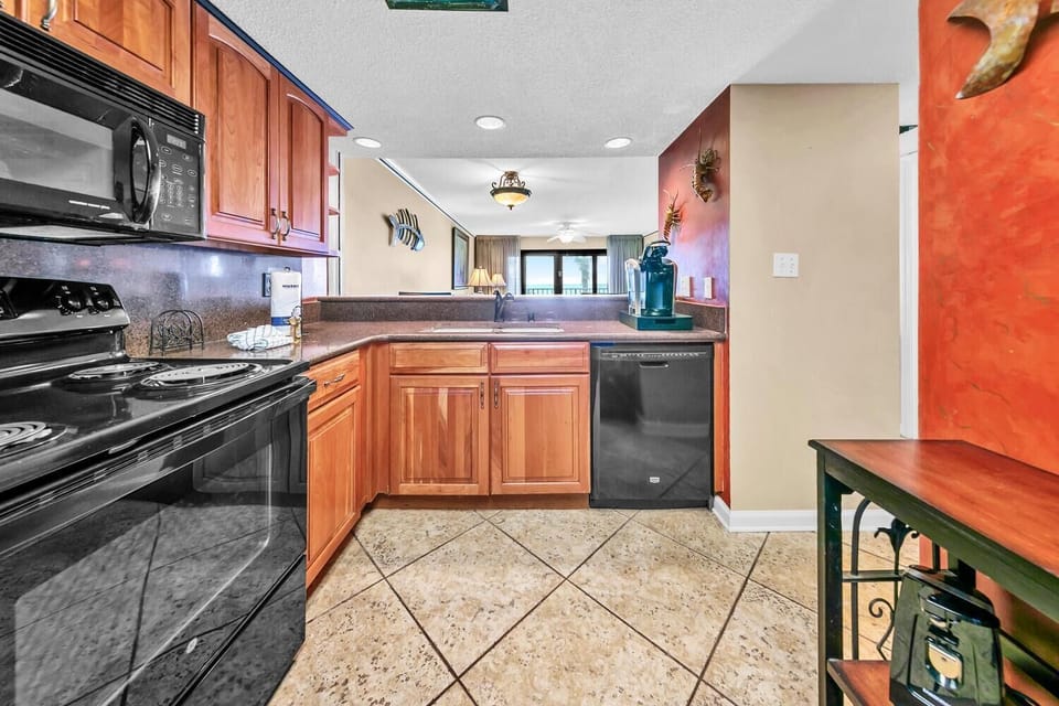 Condo, Multiple Beds (Commodore 203) | Private kitchen | Oven, toaster