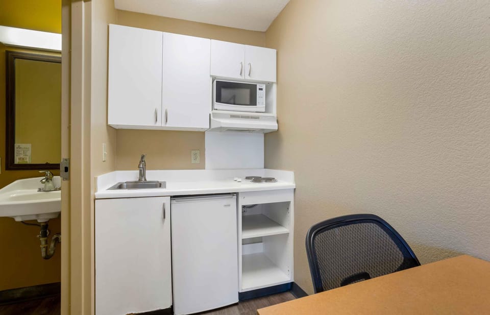 Fridge, microwave, stovetop, cookware/dishes/utensils