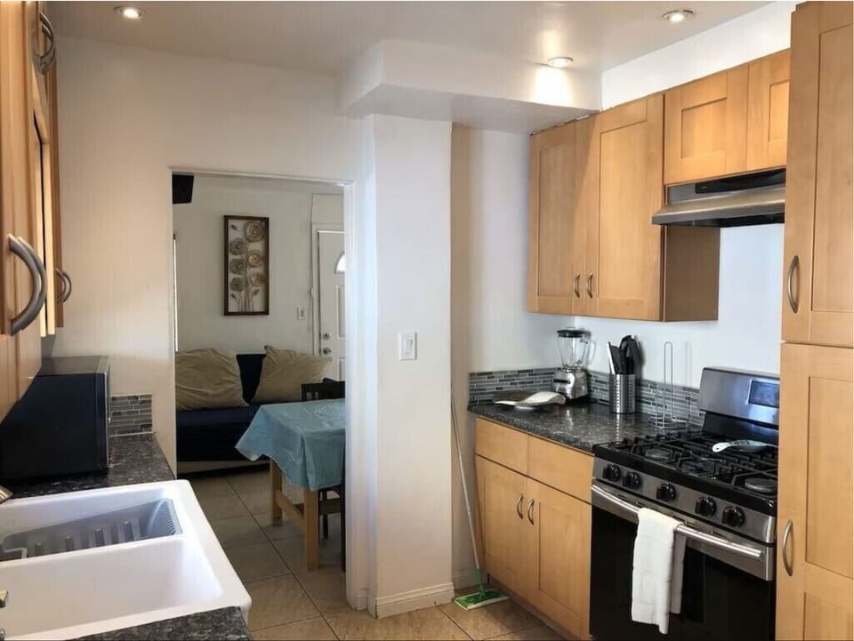 Kitchen is roomy, has all major and minor appliances and has nice double sink