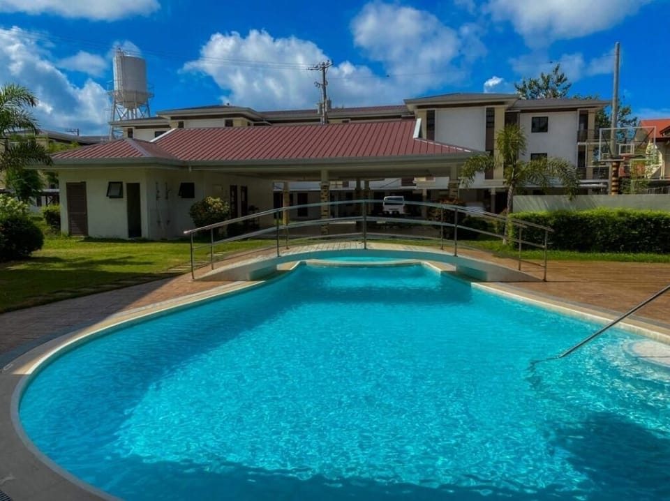 Clubhouse with gym, swimming pool, playground,  and basketball