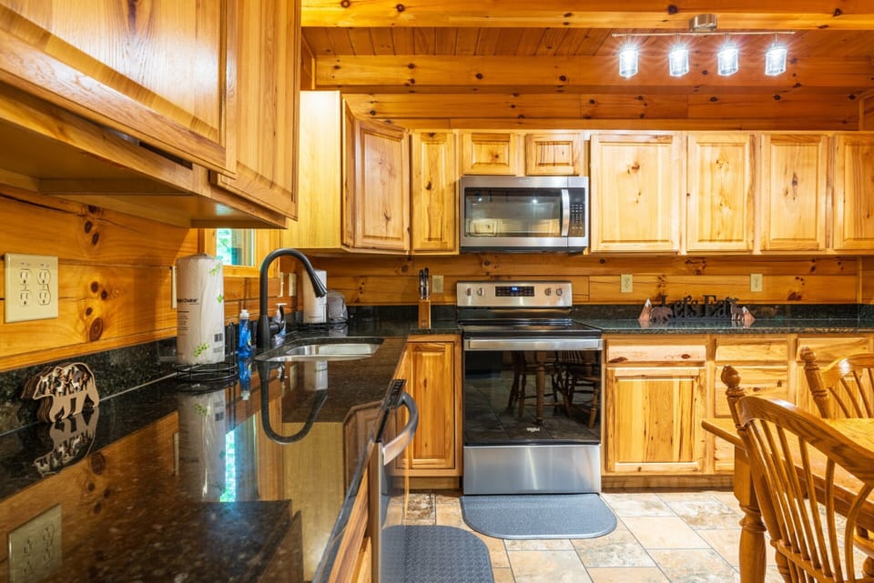 Full Ktichen stove and oven area - Grand Valley Lodge