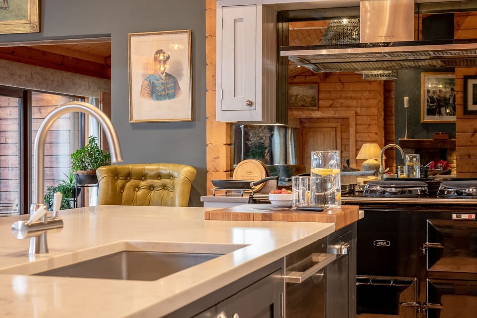 Spacious luxury kitchen with island and modern appliances in Valley View at Sun Hill Farm.