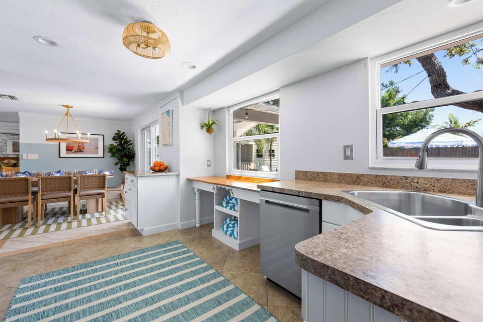  A kitchen that actually works for groups — generous counter space, a full dishwasher, and an open layout that flows right into the dining area make cooking together a breeze.