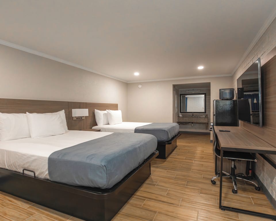 Deluxe Room, 2 Queen Beds, Non Smoking, Refrigerator & Microwave | WiFi (free)