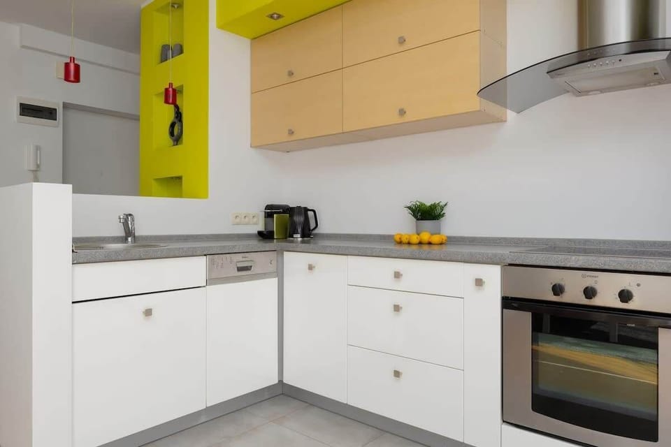 The kitchenette's practical layout maximizes space and functionality.