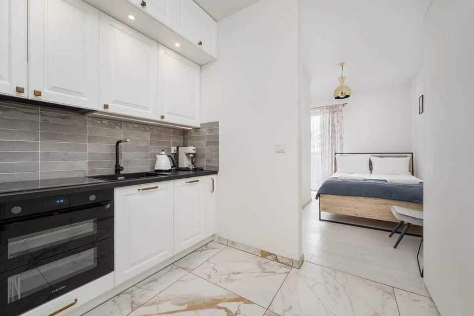 The kitchenette's practical layout maximizes space and functionality.