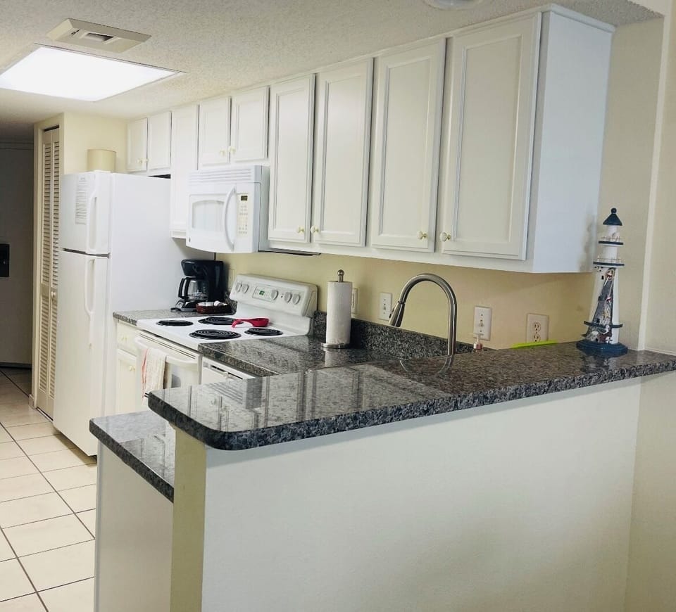 new granite, countertops, and cabinet 