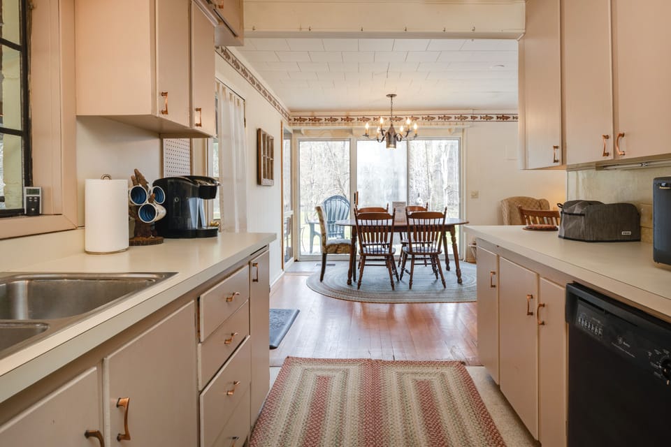 Dining area with seating for 5 indoors.