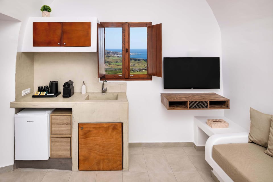 Bright Kitchenette and Living Area with Smart TV