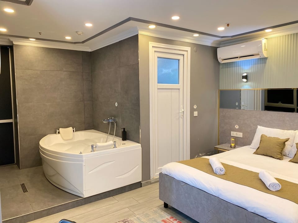 Luxury Double Room Single Use | Premium bedding, memory foam beds, in-room safe, laptop workspace