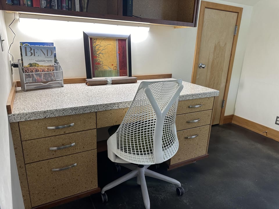 Extra desk space downstairs for fun projects or a quick virtual meeting