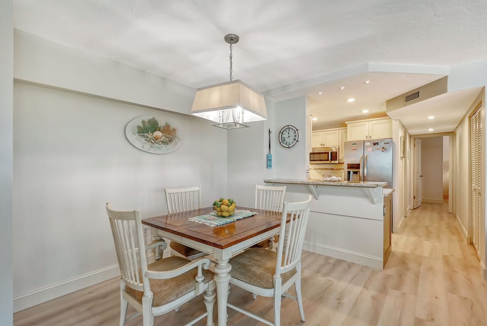 Spacious living room combines with dining area right off the kitchen