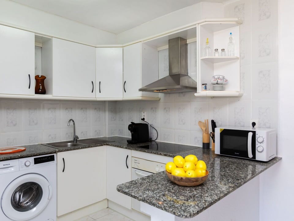 Countertop, Cabinetry, Property, Kitchen Sink, White, Sink, Kitchen Stove, Kitchen, Home Appliance, Laundry Room