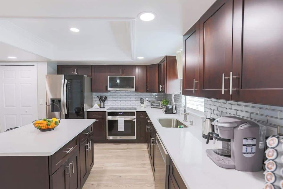 Fully equipped kitchen, with state-of-the-art appliances in Pondside Funhouse, our vacation rental home in Pinellas Park, Florida. 